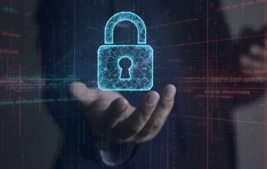 Cybersecurity concept. Businessman's hand holding a glowing digital padlock icon made of a plexus network, symbolizing data protection and secure technology.