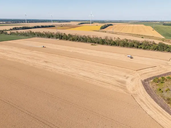 Stock image Aerial view wide angle harvesters ripe on a fields