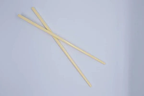 Classic Yellow Chopsticks White Background — Stock Photo, Image
