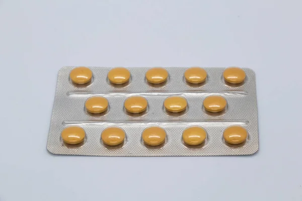 Pílulas Medicamentos Cor Laranja Papel Alumínio Embalagens Plásticas — Fotografia de Stock