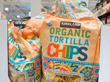 Kirkland Organic Tortilla Chips in Costco shopping clipart