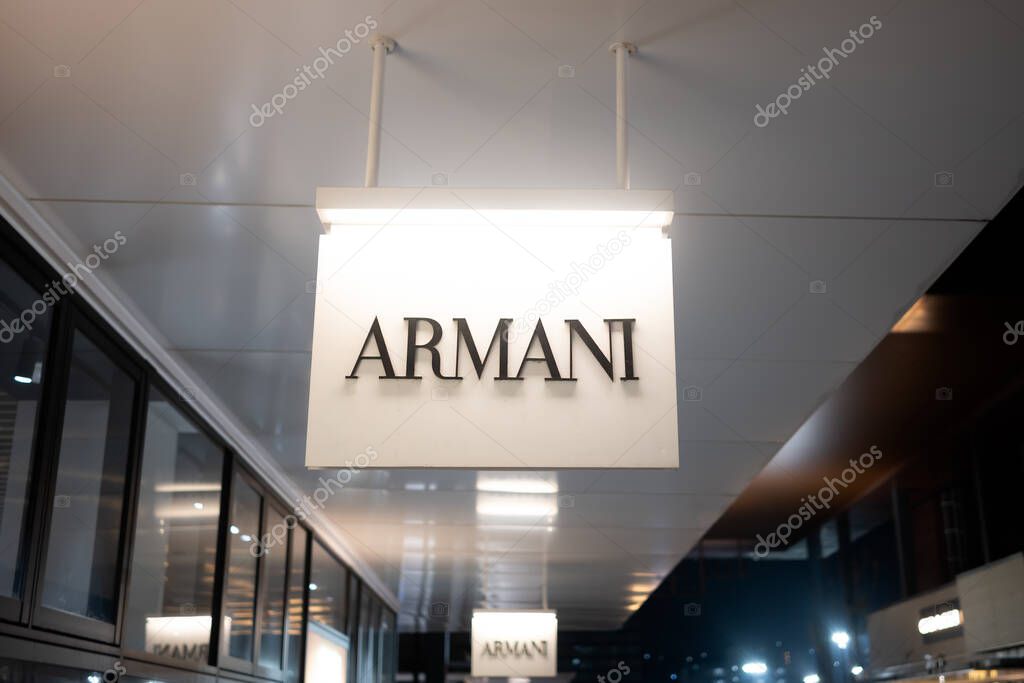 ARMANI Luxury Store storefront and logo banner in an outlet in Japan