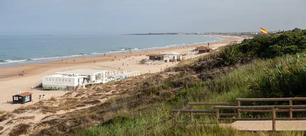 stock image La Barrosa beach, at low tide, in Sancti Petri, Chiclana de la Frontera, Cadiz, Spain