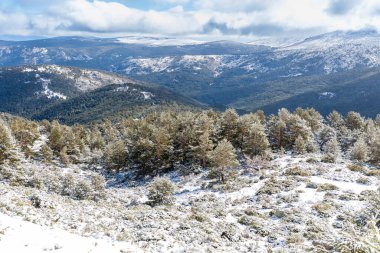 Snowy mountains in the port of Cotos in Guadarrama, Madrid clipart