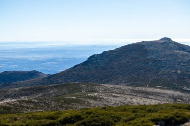 view of the mountains of the sierra de guadarrama in madrid on the way up to the communications station called ball of the world