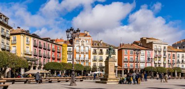 views of the main square of Burgos with people and tourists walking through its streets in Burgos, Spain