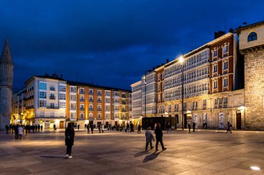 views of the main square of Burgos with people and tourists walking through its streets in Burgos, Spain