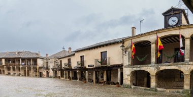 main square and details of the historic buildings of the city of Pedraza in the province of Segovia, Spain