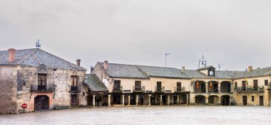 main square and details of the historic buildings of the city of Pedraza in the province of Segovia, Spain