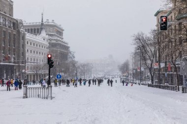 Snowscape in a street in Madrid due to the snowstorm Filomena in street alcala