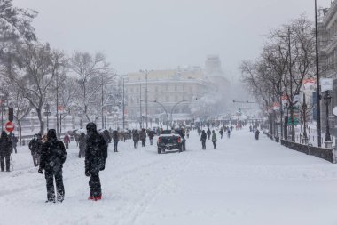 Snowscape in a street in Madrid due to the snowstorm Filomena in street alcala
