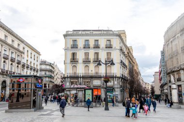 details of the historic buildings in the center of Madrid, specifically the puerta del sol