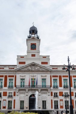 details of the historic buildings in the center of Madrid, specifically the puerta del sol