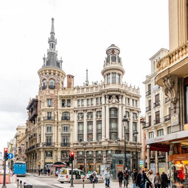 details of the historic buildings in the center of Madrid, specifically canalejas square