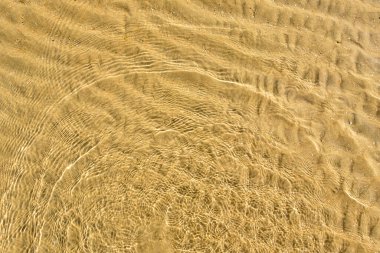 Yazın bir kumsalın kumsal desenine yakın çekim