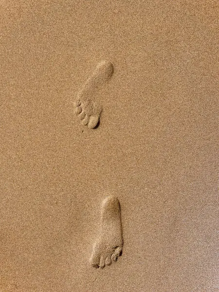 sand with footprints on the beach