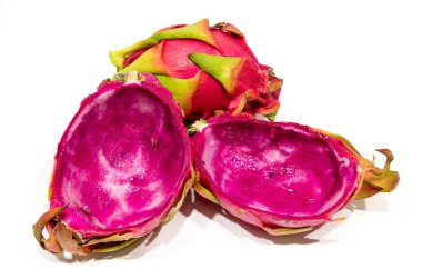 Delicious cut dragon fruit pitahaya on wooden table, closeup