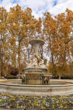 statues in the retiro park in madrid in autumn