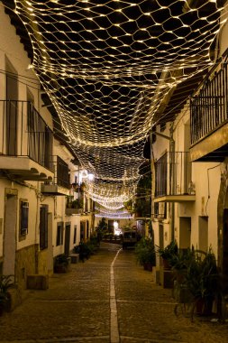 Christmas lighting in the town of Guadalupe in the province of Caceres, Spain clipart