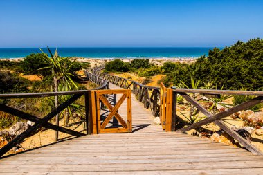 Sancti Petri 'deki La Barrosa plajında gün batımı, Cadiz, İspanya