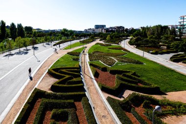 Views of the Madrid Rio park next to the Manzanares river and green vegetation around it