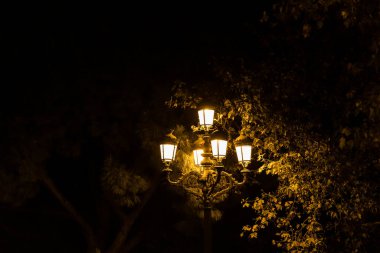 old lamppost on in the park of San Isidro in Madrid