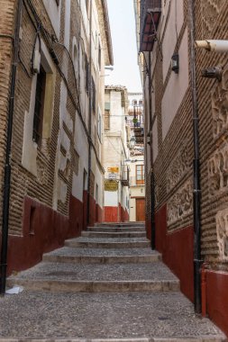 Generic architecture and street view around the main street in Granada, Spain.
