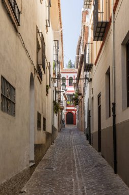 Generic architecture and street view around the main street in Granada, Spain.