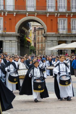 At Easter, in the main square of Madrid, every year an tamborrada held by a brotherhood coming from Zaragoza clipart