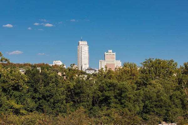 stock image Madrid, Spain skyline at Santa Maria la Real de La Almudena Cathedral and the Royal Palace with park Casa de Campo