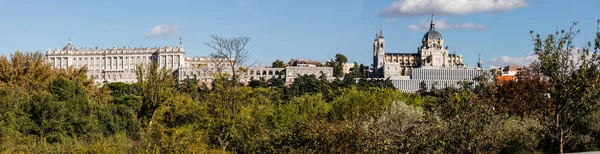 stock image Madrid, Spain skyline at Santa Maria la Real de La Almudena Cathedral and the Royal Palace with park Casa de Campo