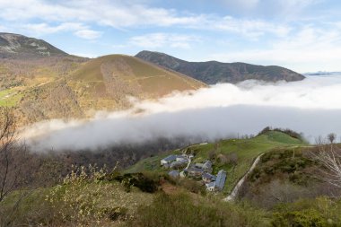 Lietariegos valley, es Asturias, Spain, covered by morning mist clipart