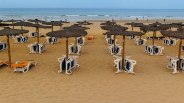 hammocks on the beach of La Barrosa, Cadiz, Spain