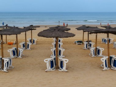 hammocks on the beach of La Barrosa, Cadiz, Spain