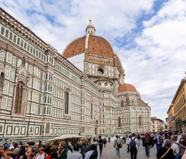 Florence, Italy - April 10, 2024: streets of Florence city center with surrounding area full of tourists in Florence, Italy clipart