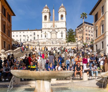 Rome, Italy - April 09, 2024: View of the Square Spain in Rome with tourists crowding its surroundings in Rome, Italy