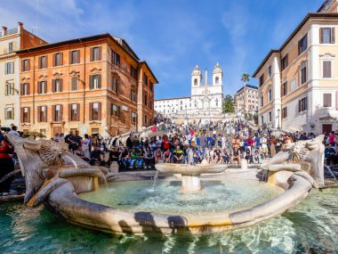 Rome, Italy - April 09, 2024: View of the Square Spain in Rome with tourists crowding its surroundings in Rome, Italy