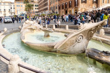 Rome, Italy - April 09, 2024: View of the Square Spain in Rome with tourists crowding its surroundings in Rome, Italy
