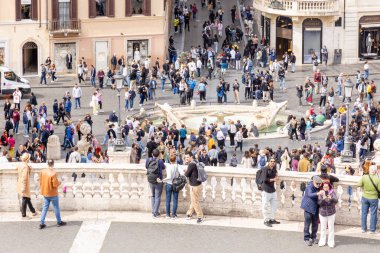 Rome, Italy - April 09, 2024: View of the Square Spain in Rome with tourists crowding its surroundings in Rome, Italy