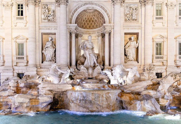 Rome, Italy - April 11, 2024: View of the details of the sculptures of the Trevi Fountain in Rome, Italy