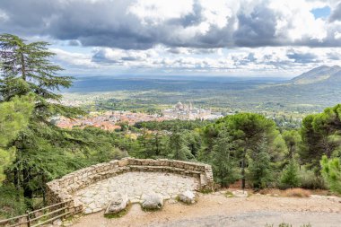 View of the El Escorial Monastery from the Abantos mountain viewpoint clipart