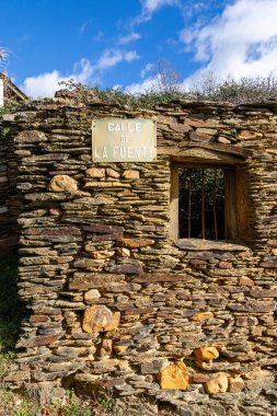 Slate stone antique village of Roblelacasa. Black architecture. Guadalajara, Spain clipart