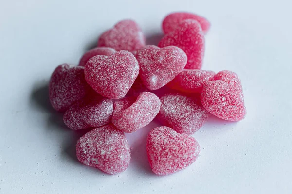 Some pink sweet candies on a white background. Sweet food. Love. Valentines Day.