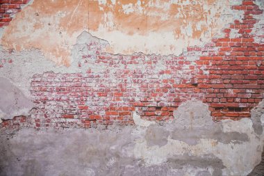 Beyaz tuğla ve turuncu tuğla duvar. Turuncu boyalı eski tuğla duvar arka planı.