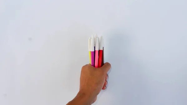 Hand Holding Several Colored Markers White Pad — Stock Photo, Image