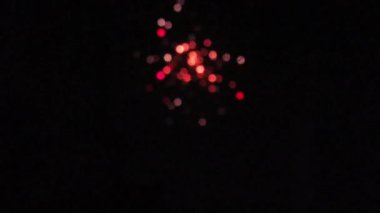Colorful New Year Celebration fireworks with some added noise in it, HD footage.