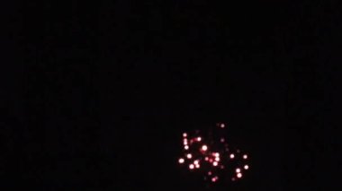 Colorful New Year Celebration fireworks with some added noise in it, HD footage.