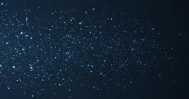 Suyun altında hareket eden toz parçacıkları küçük kaynak 4K Stok görüntüsü. Parçacıklar lüks düzlük bokeh arka plan. Parıltılı ödül tozu, kuyruk dalgası peri tozu..
