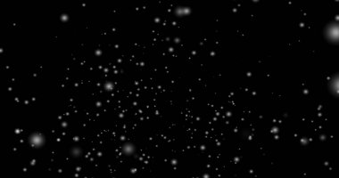Gerçeküstü bir kar tanesinin bg düşüşünün sinematik kar yağışı döngüsü animasyonu. Kar yağışı, siyah bir arka planda yavaş yavaş hareket grafiği oluşturur. Yeni yıl için 2026-2025 yıllarında kar tanecikleri.