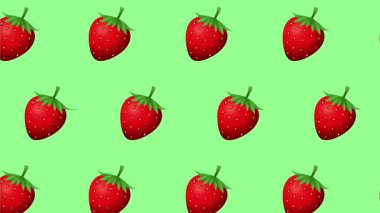 Parlak kırmızı çilekler canlı yeşil bir zemin üzerine düzgün bir şekilde dizilmiş, taze ve canlı meyve temalı görsel estetiği çağrıştırıyor.
